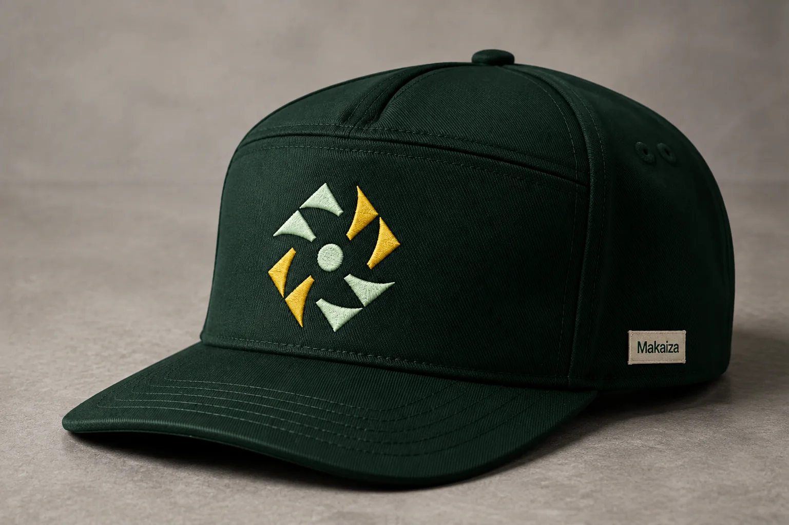 Makaiza Farms symbol embroidered on a green cap